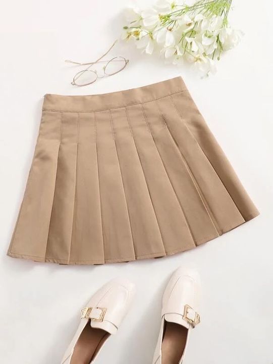 Post image I want 1 Pieces of Single piece of this pleated mini skirt in black colour .
Below is the sample image of what I want.