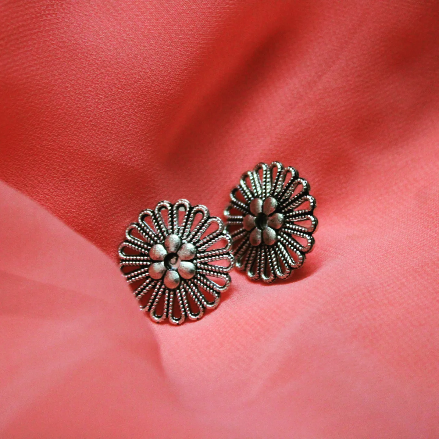Flower oxidised earrings uploaded by business on 1/21/2022