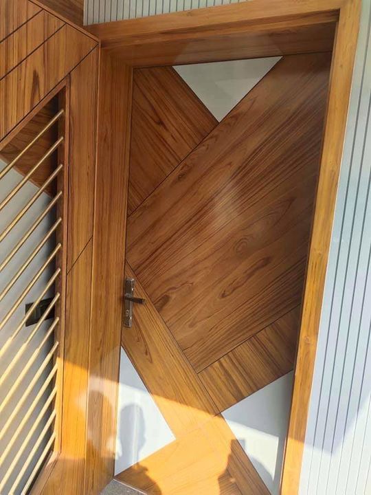 Wooden main door uploaded by Vishvkaram interior & conturction on 1/24/2022