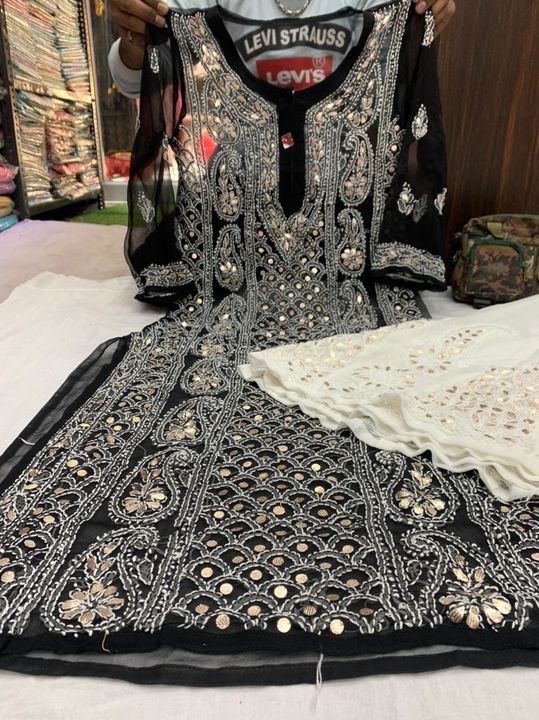Post image Whatsapp 8090801198Lucknowi Chikankari maahi jaal gotapatti work kurti with gota sharara
Fabric. Georgette
Length.46 approx
Size:- 38 to 42
Price:-                650/-Sharara:-.           540/- Shipping:-          100/-