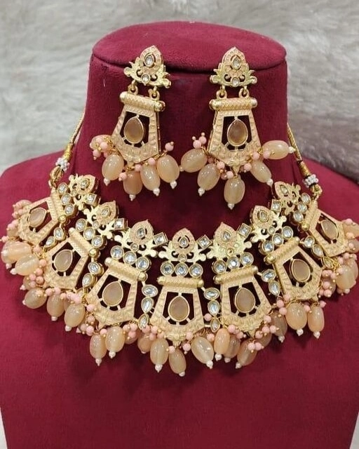 Post image Catalog Name:*Shimmering Charming Women Jewellery Set*Base Metal: BrassPlating: Oxidised Gold,Oxidised SilverStone Type: Artificial Stones,PearlsType: Choker and EarringsMultipack: 1Easy Returns Available In Case Of Any Issue*Proof of Safe Delivery! Click to know on Safety Standards of Delivery Partners- https://ltl.sh/y_nZrAV3