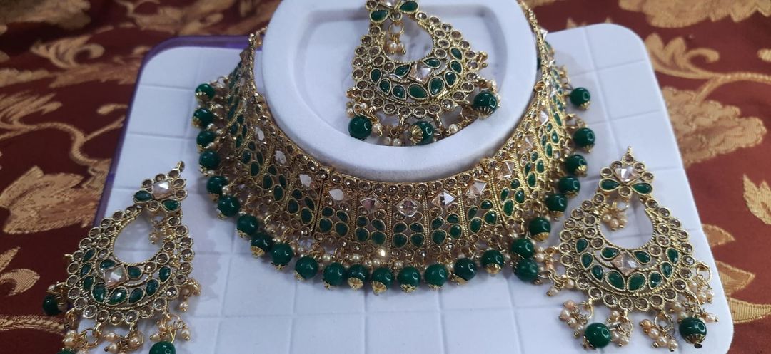 Golden jerkin with green colour  beads uploaded by business on 1/30/2022