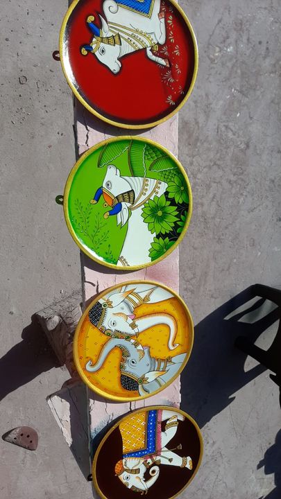 Wooden plates uploaded by Girish handicrafts wooden items jod on 2/1/2022
