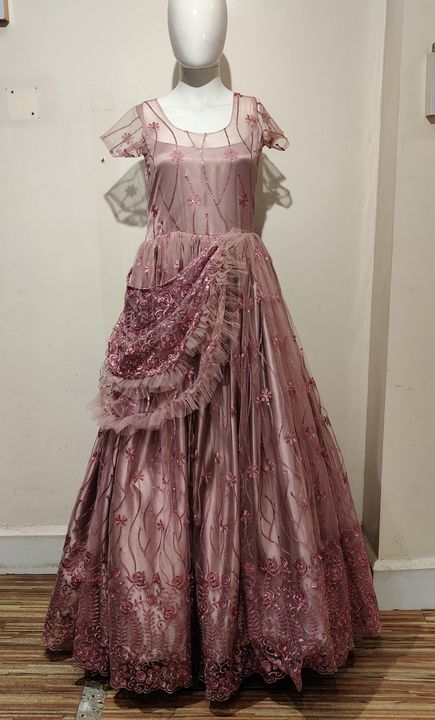 Product image with price: Rs. 8200, ID: peach-frill-gown-fa080868