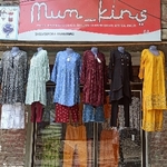 Business logo of Mum_kins clothing shop