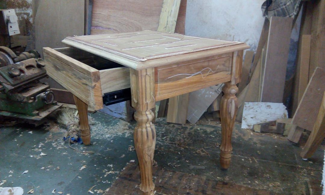Wood carving table uploaded by business on 2/17/2022