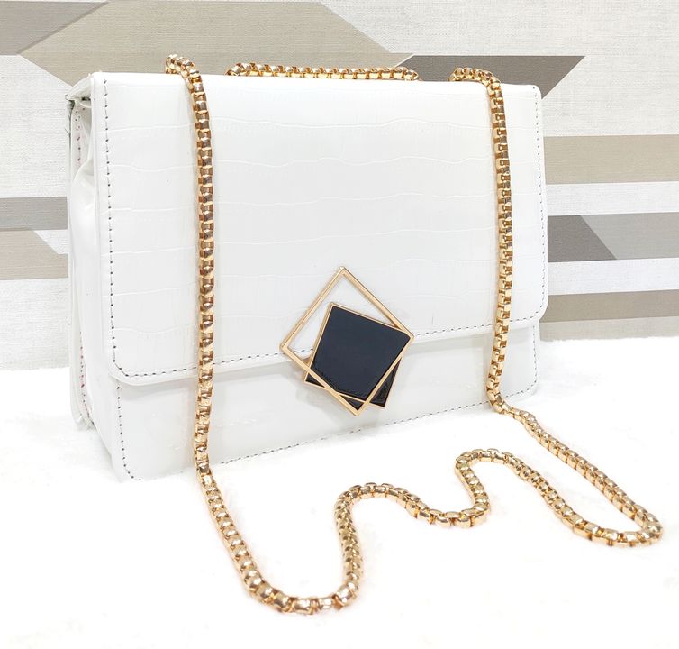 Post image BRAND: CHARLES &amp; KEITH SLING
➣ Can Be Paired With Any Western &amp; Traditional Outfit.
➣ Perfect for Daily Use.
➣ Handy + Sling.
➣ Double Partition.

➣ Long Adjustable Golden Coated Heavy Chain.
➣ Size of Sling:H: 6”×L: 8.5”.
➣ Shining Croco Leather Material.
➣ Rich Quality.

➣ Video Provided For Specifications.
➣ Limited Stock.
*BEST PRICE*
