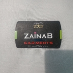 Business logo of Zainab Garments
