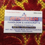 Business logo of Adarsh Handloom and Handicrafts