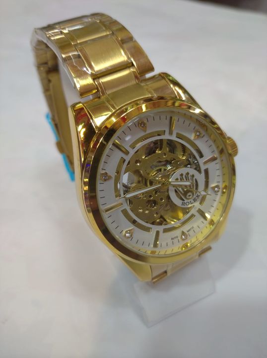 Rlx gold watch uploaded by business on 2/22/2022