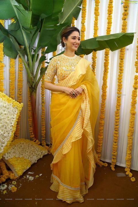 Post image *Screen code :- Tamanna yellow*
🔥 Launching New demanding Bollywood Concept saree of Tamanna Bhatiya wear Yellow Saree With Embroidered work blouse saree🔥
               🗒️ *DETAILS* 🗒️
*FABRIC* :- Soft Organza
*WORK* :- Digital print border Less &amp; heavy Embroidery work Blouse
*SAREE LENGTH* :- 5.5mtr
*BLOUSE* :- Butterfly Soft Net ( *Full Stitch 38 to42* )
*RATE* :- *1250₹*