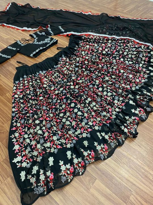 Post image *MF-(92)*  💃 *Lehenga choli* 💃G76Black colour Dulhan Lehenga Choli, Wedding Lehenga Choli, Party Dress.
Black colour Embroidered Attractive Party Wear Silk Lehenga choli has a Regular-fit and is Made From High-Grade Fabrics And Yarn.
💃 *Lehnga Fabric*:- Georgette fabric
💃 *Dupatta Fabric*:- Heavy Georgette fabric Fancy Border Less Work (dupatta size 2.40 meter)
💃 *Blouse Fabric* :Georgette fabric
💃 *Lehenga Inner* :- American Crep
💃 *Colour* :- black colour
💃 *Blouse Work*:- , Multi Niddle Work, Zari work, Embroidery Work.
💃 *Lehenga Work* :- 5 Niddle, Multi Niddle Work, Zari work, Embroidery Work, Less.
💃 *Type* : Lehenga :-Semi Stitched,  Blouse:-Unstitched 
💃 *OCCASIONS* :- Festival, Party, Traditional, Wedding, Dulhan Lehenga , Bridal Lehenga, Marriage Special, Party Wear.
💃 *Weight* :-1.30 kg
💃 *Size* :- Free Size,Lehenga: Length-42" Inches Width-up To 42 to 44" Flair bottom-up to 3.30 Mtr.
*RATE :- 1850/- Freeship*
👑 *KING OF QUALITY* 👑