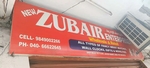 Business logo of Zubair clothing centre
