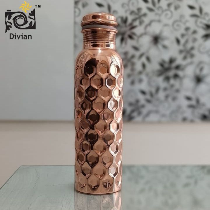 Diamond Cut Copper Water Bottle 950ml uploaded by Divian Decor Exports on 3/9/2022