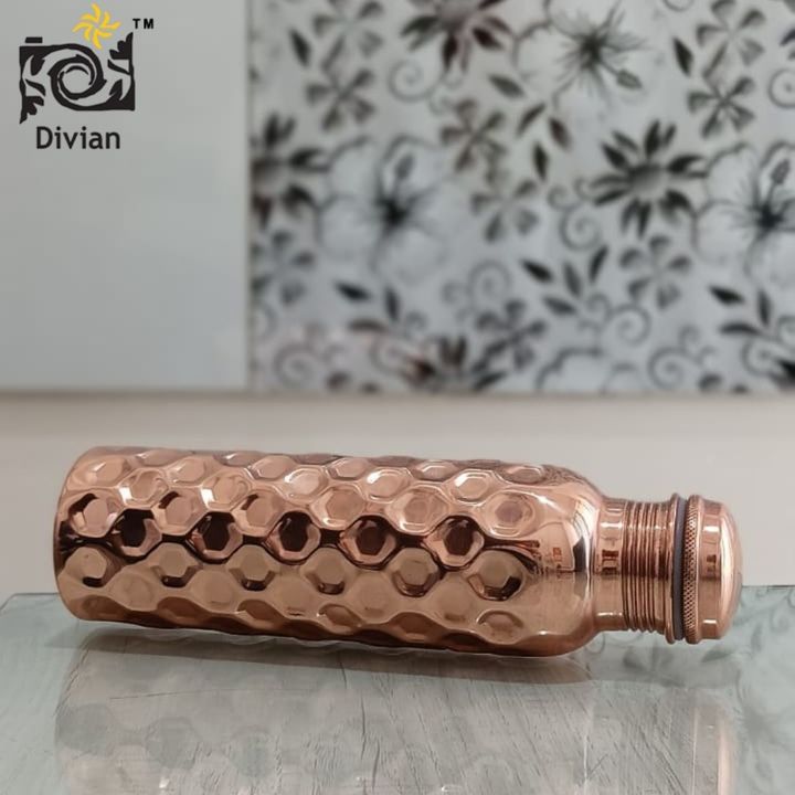 Diamond Cut Copper Water Bottle 950ml uploaded by Divian Decor Exports on 3/9/2022