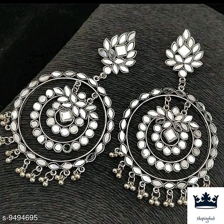 Princess Graceful Earrings

Base Metal: Glass
Plating: Oxidised Silver
Stone Type: Kundan
Sizing: No uploaded by business on 10/13/2020