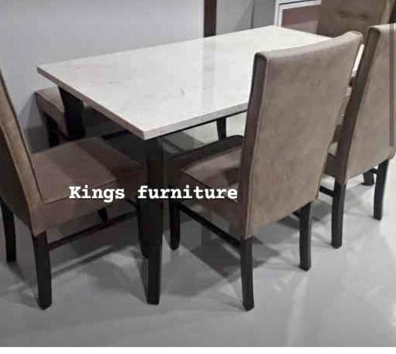 Granite top Dining with 4 chairs and 1 bench uploaded by Kings furniture on 3/17/2022