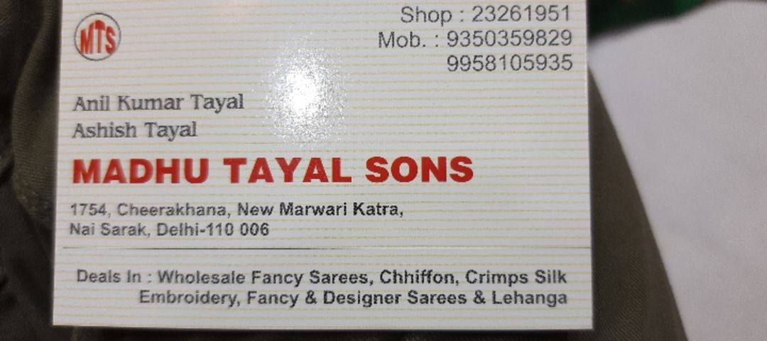 Visiting card store images of Madhu Tayal Sons