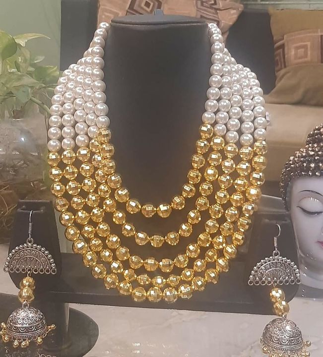 Pearl and golden beads uploaded by Devi- house of trust and exclusive fashion on 3/24/2022