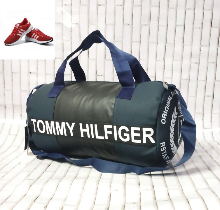 *TOMMY HILFIGER*

UNISEX GYM BAG

ATTACHED HANDLE AND SLING BELT

SYNTHETIC MATERIAL

SHOES COMPARTM uploaded by XENITH D UTH WORLD on 3/28/2022