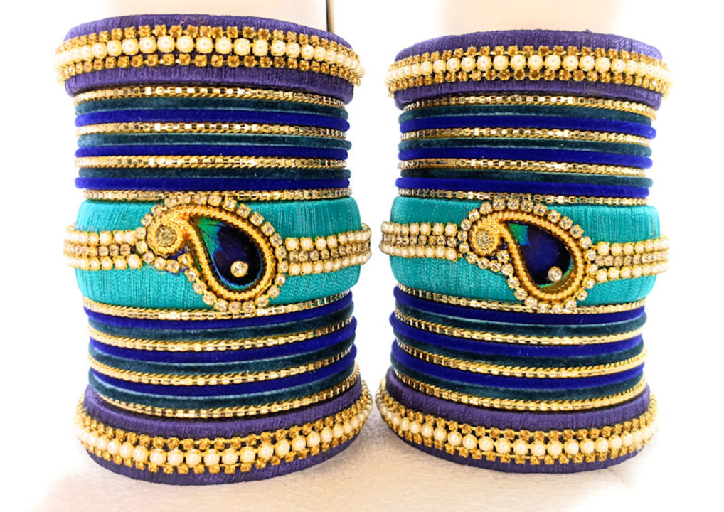 Peacock feather bangles set uploaded by business on 3/30/2022