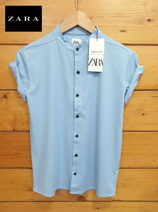 Product image with price: Rs. 750, ID: zara-full-button-t-shirt-610a85b3