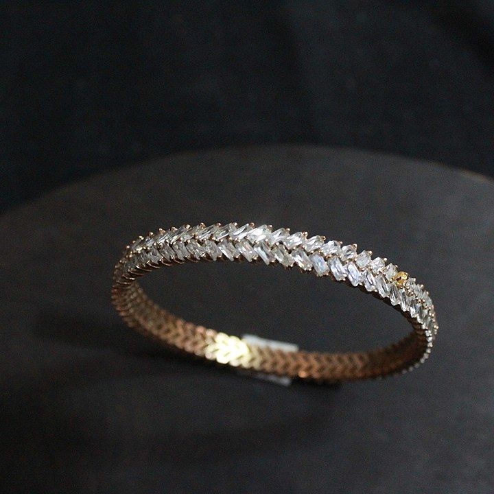 Zircon baguette seted gold plated bangle  uploaded by Bhrti impex on 10/16/2020