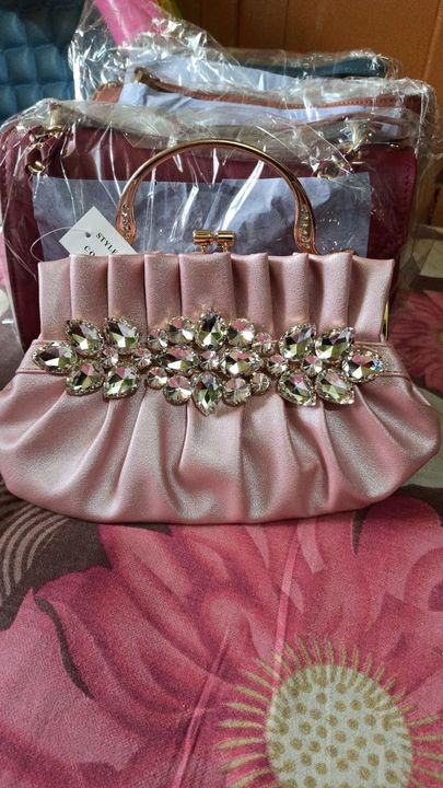 Partywear clutches uploaded by Padma Kumari on 3/31/2022