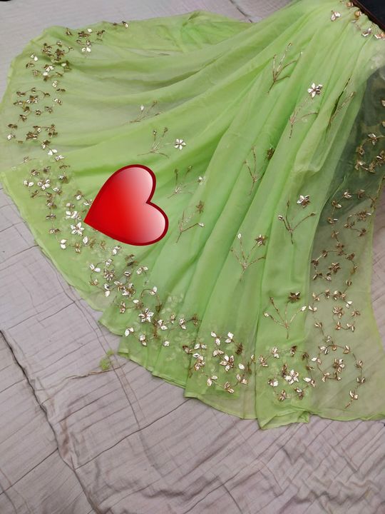 Beautiful orignal kundal saree
Nazmin fabric material with gota patti heavy work
 uploaded by business on 4/2/2022