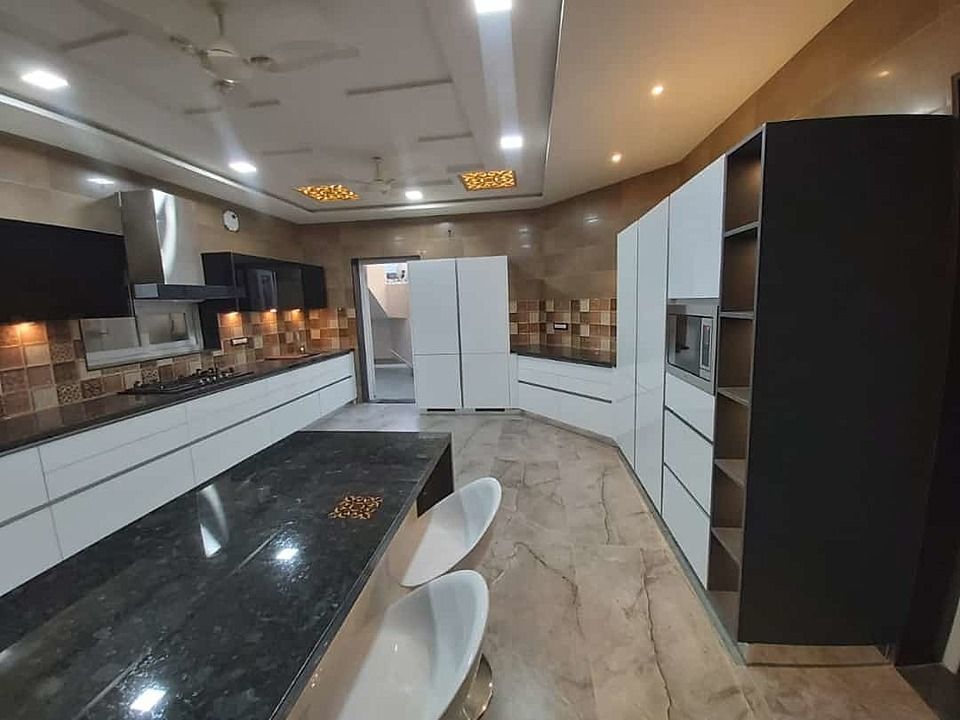 Modular kitchen shutter ( Corian & Glass Acrylic) uploaded by Lifestyle the furniture mall on 10/20/2020