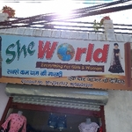 Business logo of She world (women and kids wear)