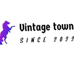 Business logo of Vintage town clothing company 