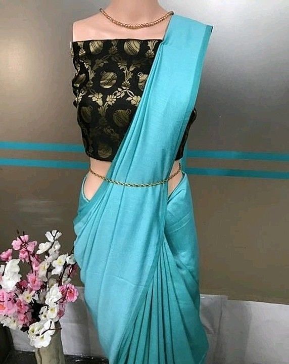 Post image Saree Fabric: Vichitra Silk
Blouse: Separate Blouse Piece
Blouse Fabric: Jacquard Silk 
Pattern: Solid 
Multipack: Single