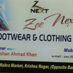 Business logo of Zee next Footwear and Clothing gallery