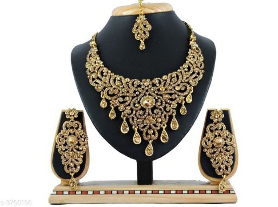 Post image Women's Alloy Gold Plated Jewellery Set

Base Metal: Alloy
Plating: Gold Plated
Sizing: Adjustable
Stone Type: Artificial Stones
Multipack: 1
Type: Necklace Earrings Maangtika

All types of jewellery available..
For enquiry WhatsApp us on 8299102720