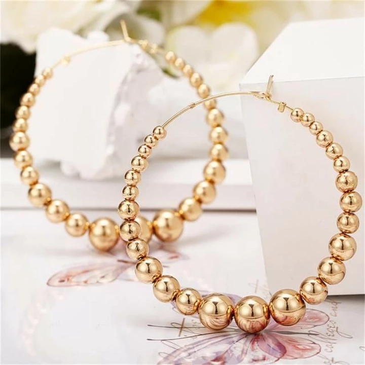 Golden Pearls Big Hoop Earrings uploaded by Jumbo on 5/10/2022