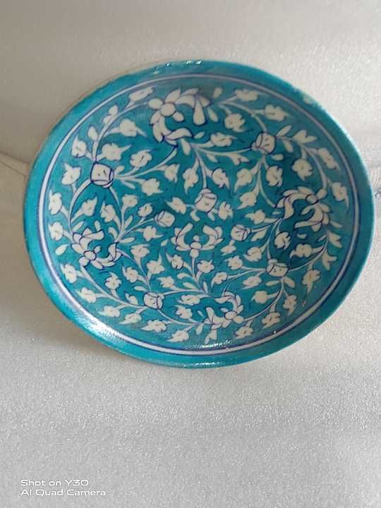 blue pottery plate uploaded by business on 10/25/2020