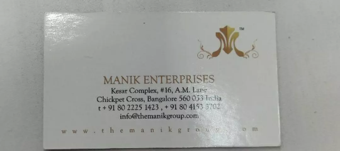 Visiting card store images of Manik Enterprises