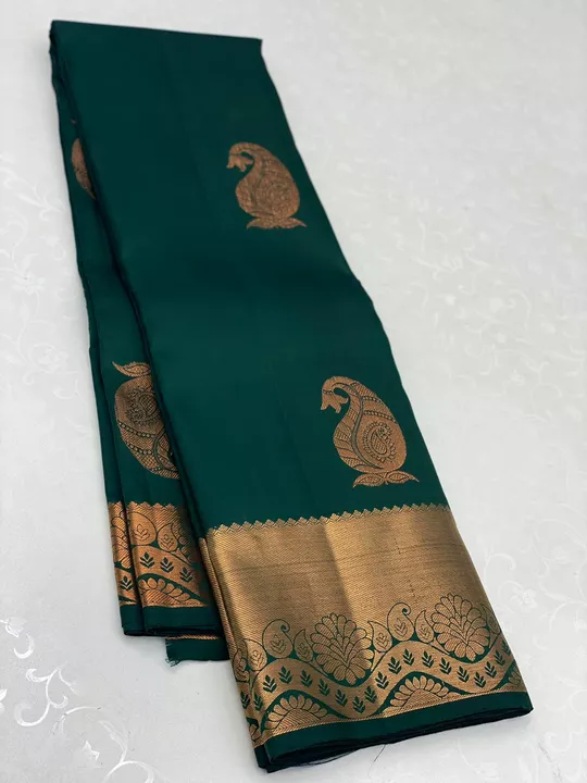 Post image *Price: 10200+shipping* 

D green Kanchipuram handloom pure  silk saree with 1G pure Jari,Rich pallu and plain blouse srivai saree

*SILK MARK CERTIFIED*