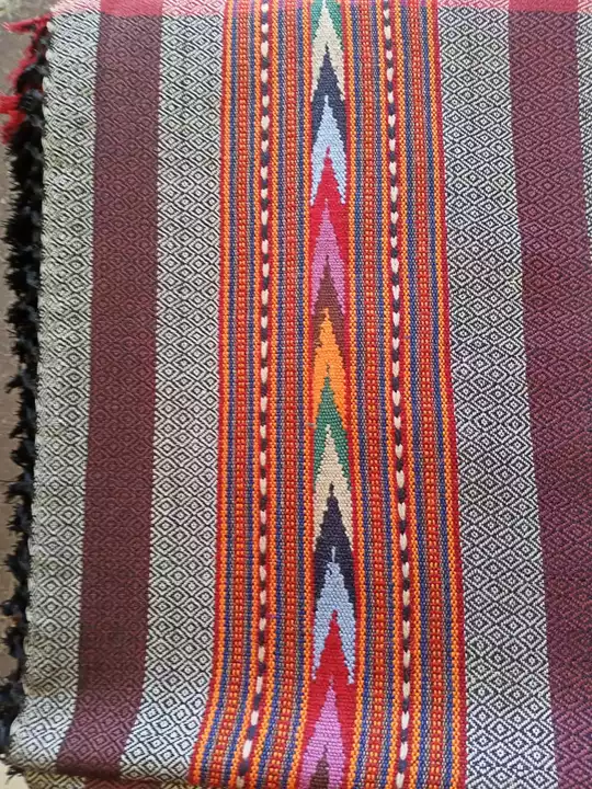 Post image A Himachali shawl is a type of shawl made in Kullu, Himachal Pradesh, India, featuring various geometrical patterns and bright colors