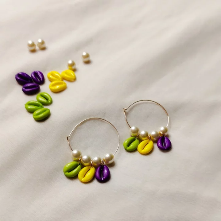 Cowrie Shell Hoop Earrings uploaded by Spirited Style Finds on 6/18/2022