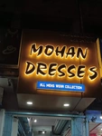 Business logo of Mohan Dresses