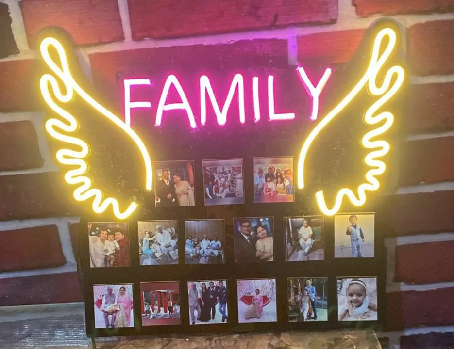 Post image Product name - Full acrylic neon family photo frame with wings 🟢Size -  15*18 🟢Price - 1300
With 1 year warrant