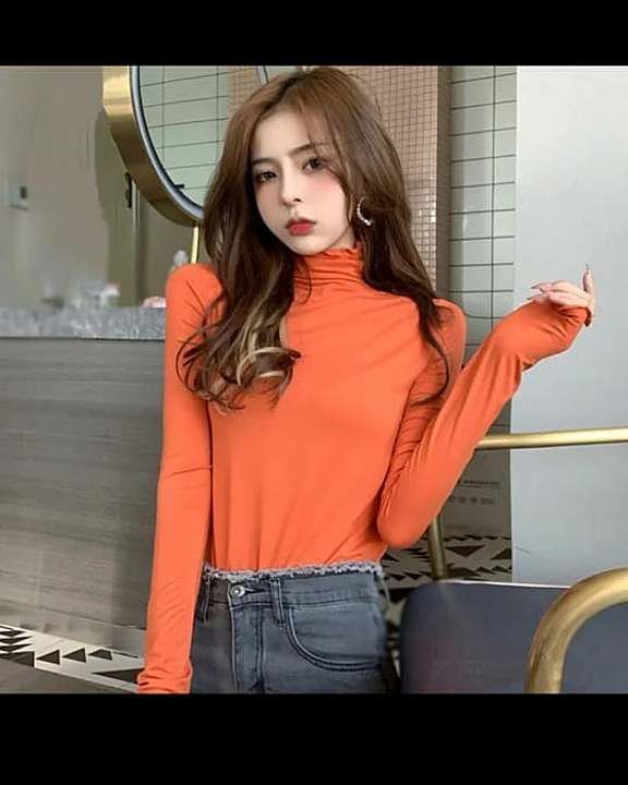 Orange mock neck top in just 
Size till 38 bust 
Knitted 

No less ❌ uploaded by Bend The Trend  on 11/8/2020