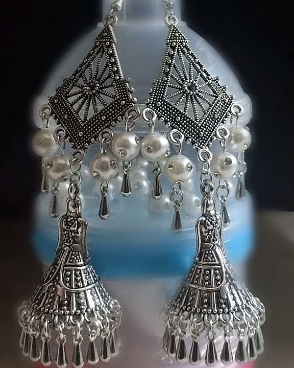 Elegant jhumka with white beads uploaded by business on 4/28/2020