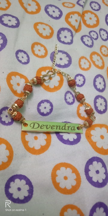 Costomized Name Rakhi with Rudraksh uploaded by Costomized Gift shops on 7/11/2022