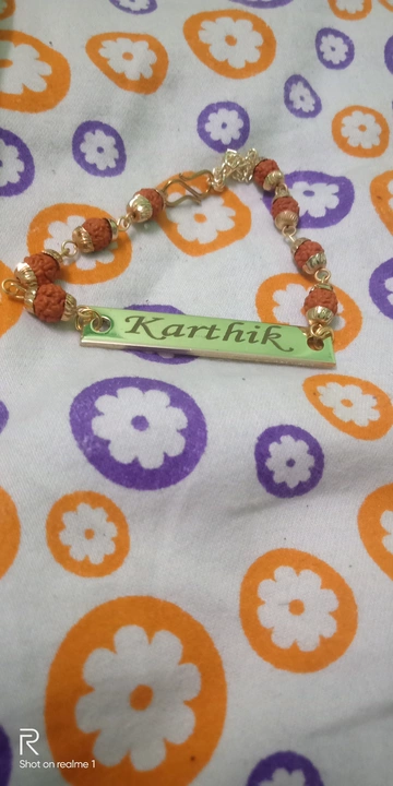 Costomized Name Rakhi with Rudraksh uploaded by Costomized Gift shops on 7/11/2022