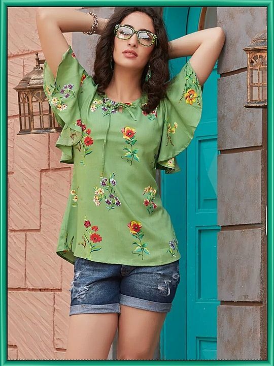 Product image with price: Rs. 499, ID: olive-green-floral-bell-sleeves-rayon-western-top-5c4215fc