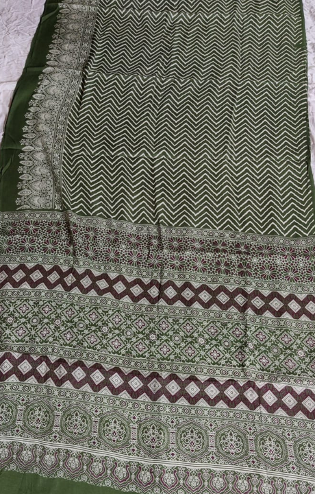 *TREDITIONAL KUTCHI LOOK*
AJARAKH PRINT SAREE

Fabric-- modal silk (semi gaji)

Length--6.5 meters w uploaded by business on 7/22/2022