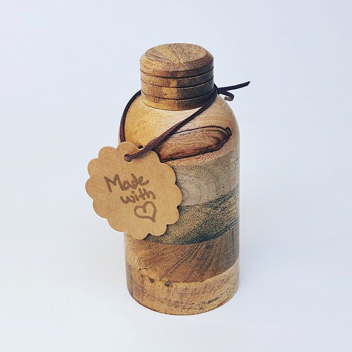 Wooden bottles with glass inner uploaded by business on 11/16/2020